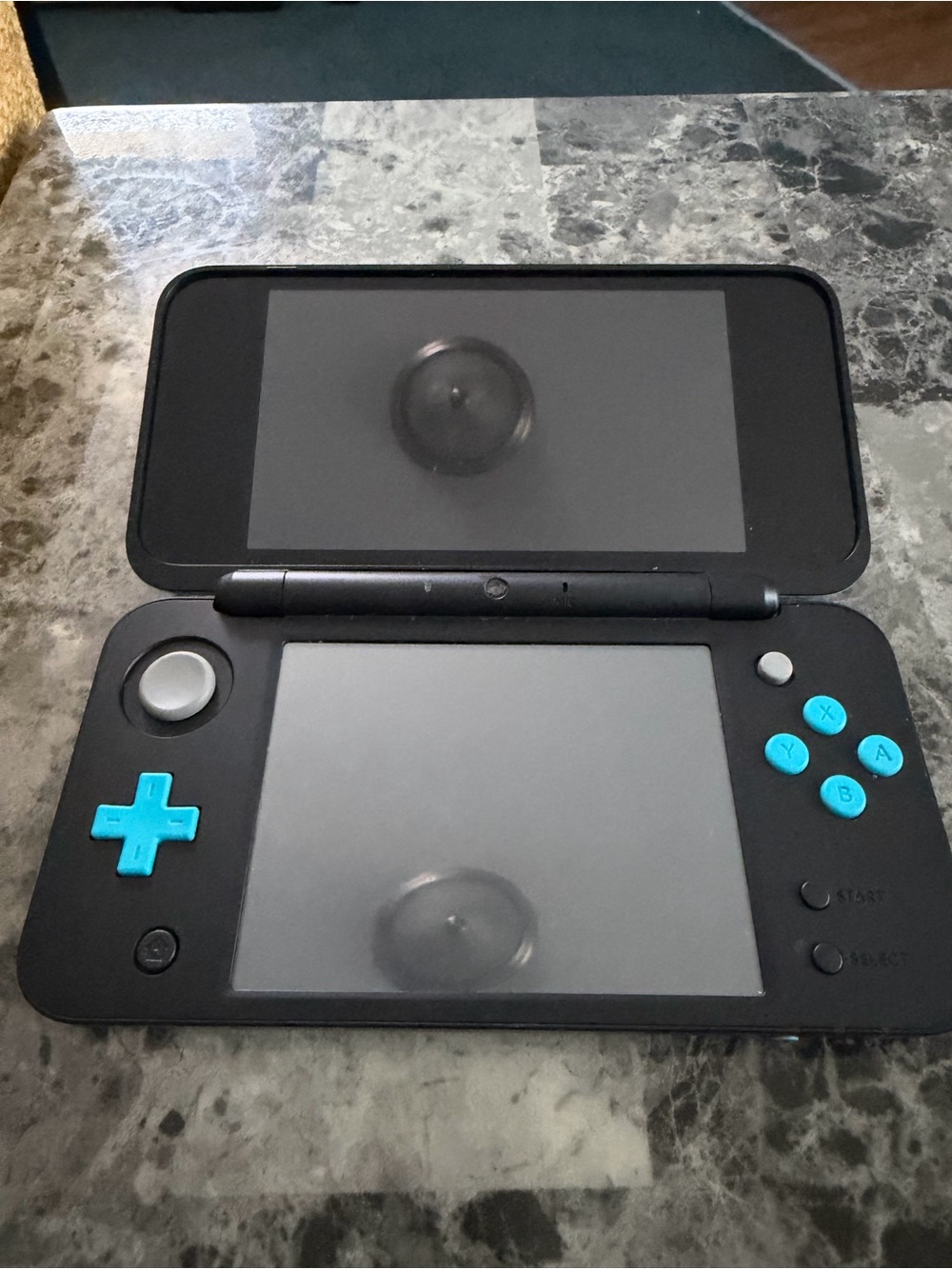 Nintendo Dual-Screen Handheld Console in Black with Teal Buttons
